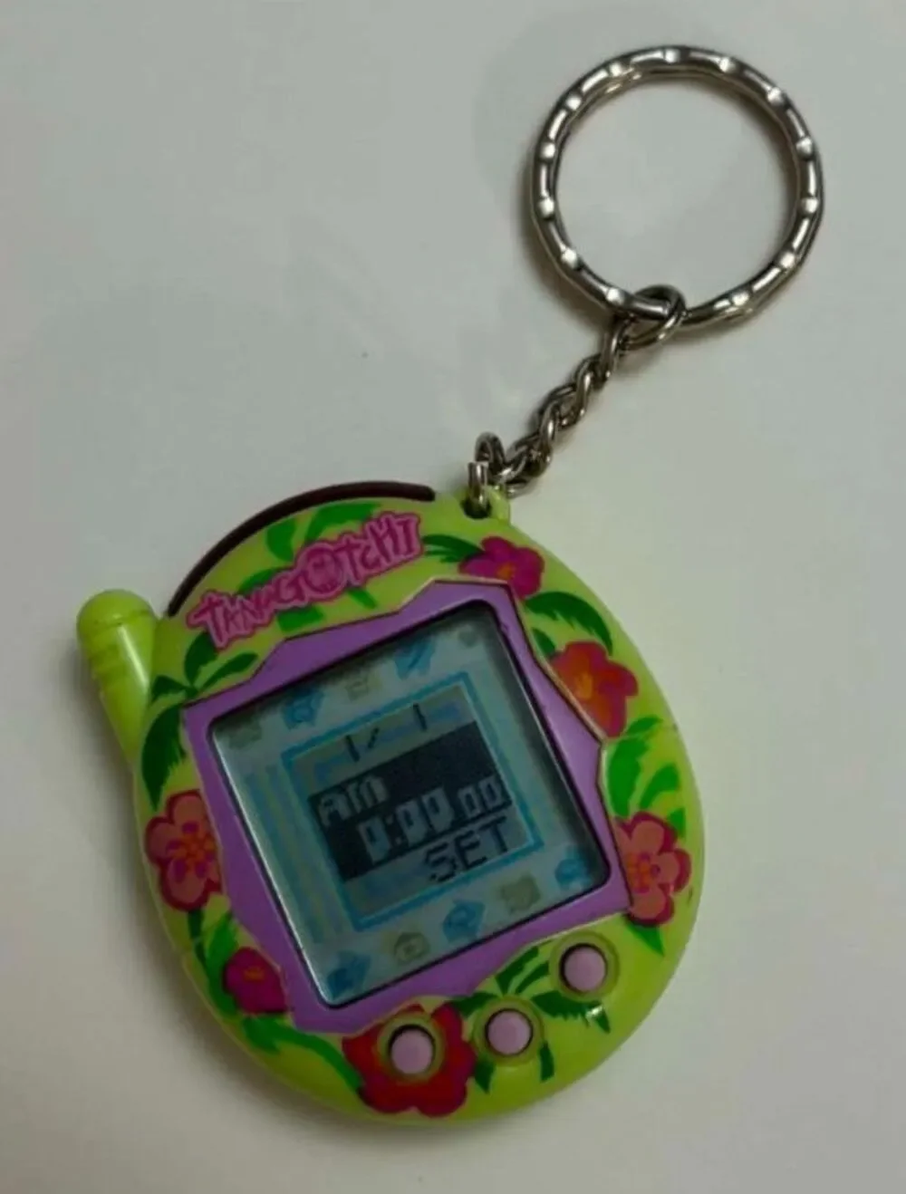 Vintage Tamagotchi Connection V3 Hibiscus Tropical Green TamaTown 2004 Keychain